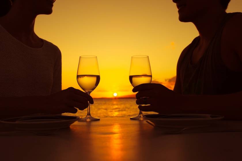 romantic couple sharing wine